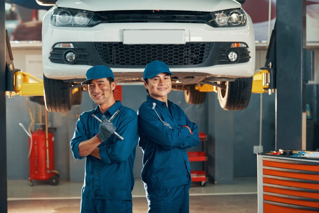 Mechanics working in auto service